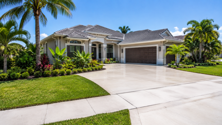 Cape Coral home with a freshly pressure-washed driveway