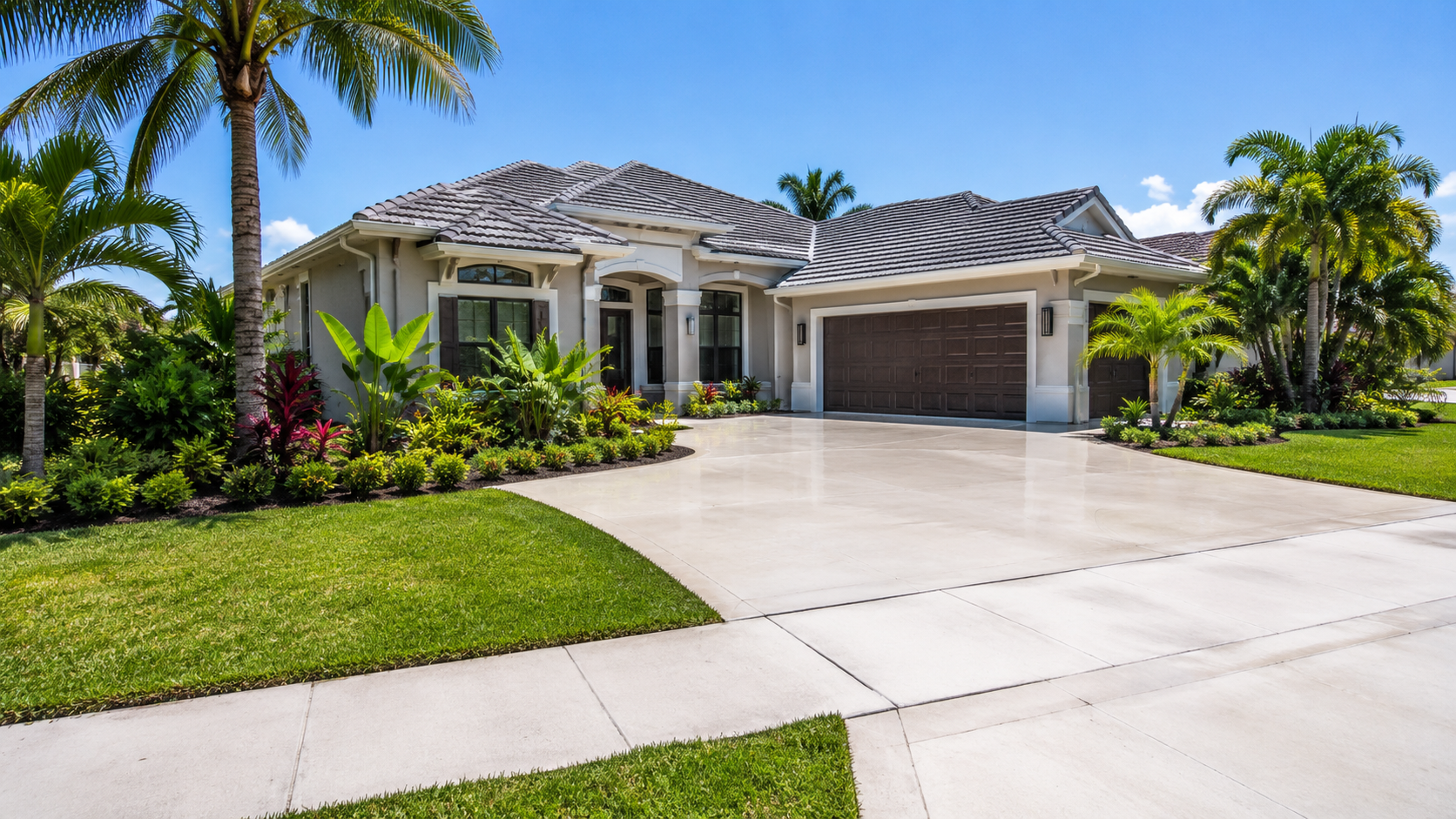 Cape Coral home with a freshly pressure-washed driveway
